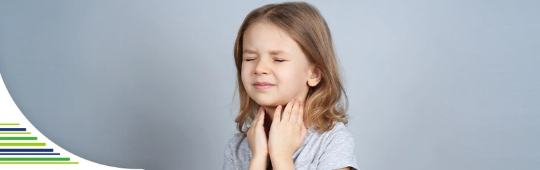 Crying child holding throat