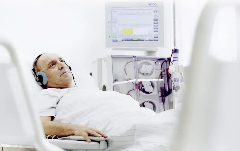 Man on dialysis machine