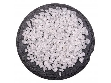 Coarse salt crystals on slate plate
