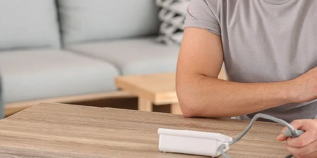 Man measuring blood pressure