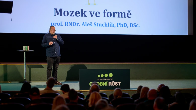 Man giving presentation on stage